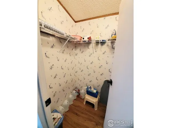 a view of small space with racks on the wall