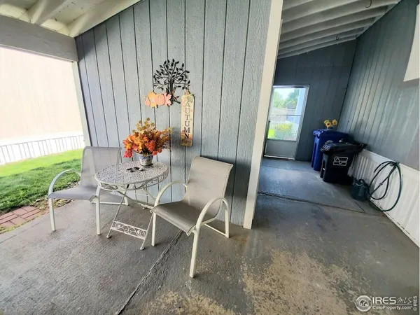 a view of a chairs and table in a room