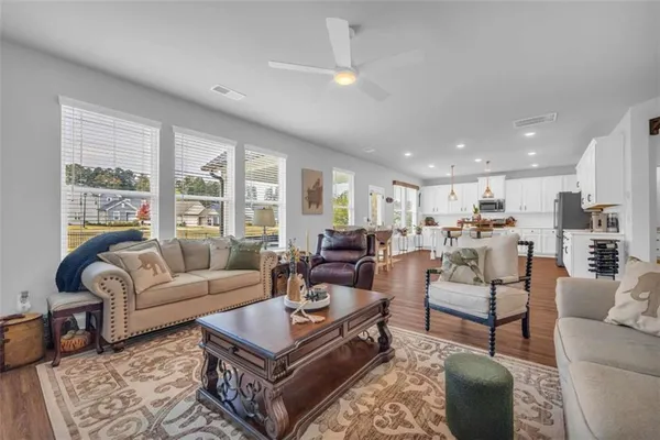 a kitchen with cabinets and stainless steel appliances