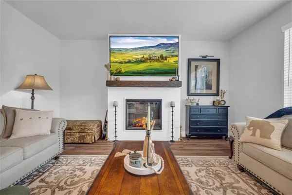a kitchen with stainless steel appliances a sink stove and cabinets
