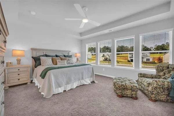 a terrace with outdoor seating and city view