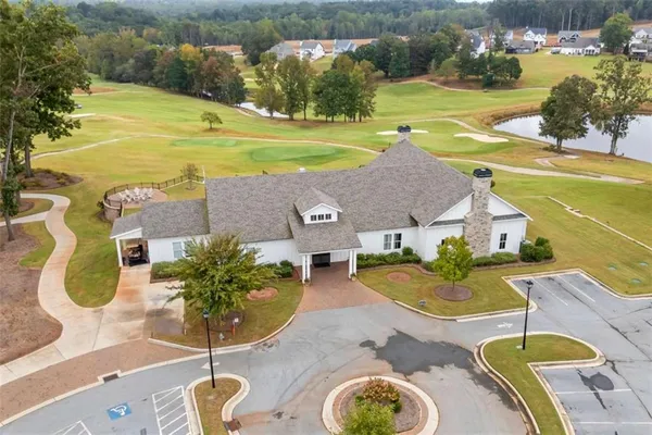 a aerial view of a house with a big yard