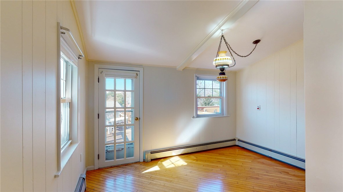 49 Spring Street Westerly, RI 02891 - Photo 8 of 37 1st unit dining area with deck access
