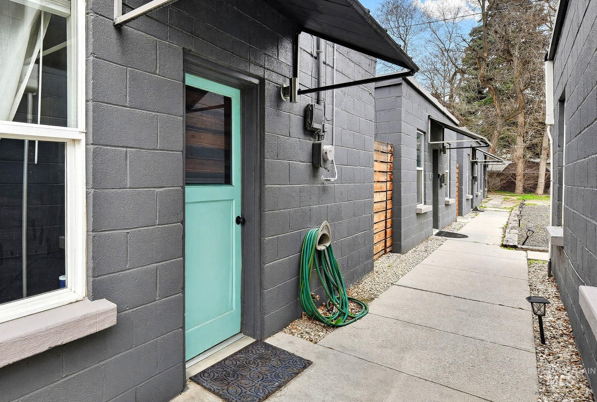 2104 North 18th Street Boise, ID 83702 - Photo 3 of 19 View of exterior entry featuring concrete block siding