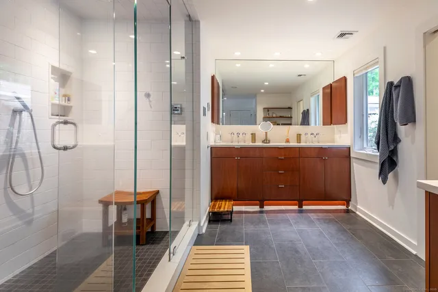 a view of a bathroom from the gallery