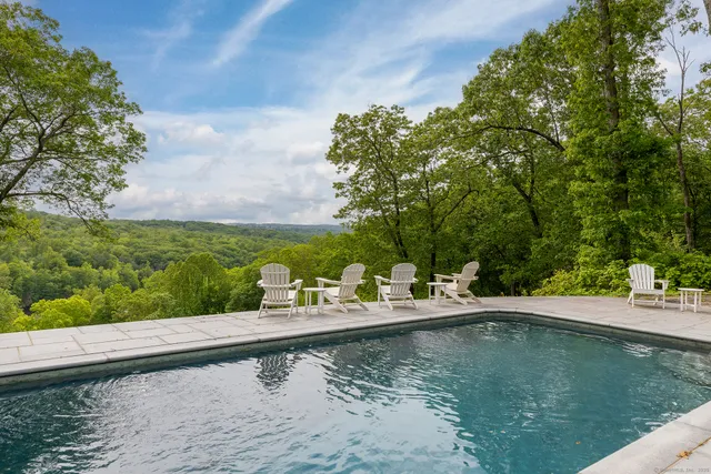 a view of a lake with a yard