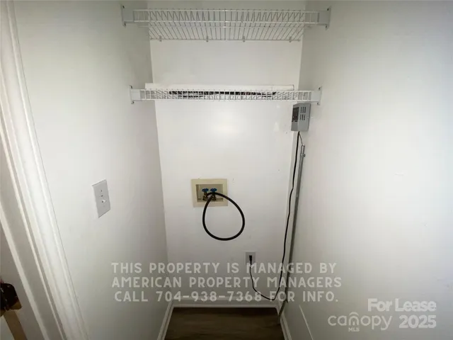 a bathroom with a sink vanity and a mirror
