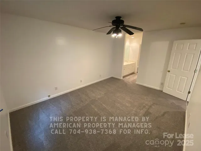 an empty room with wooden floor