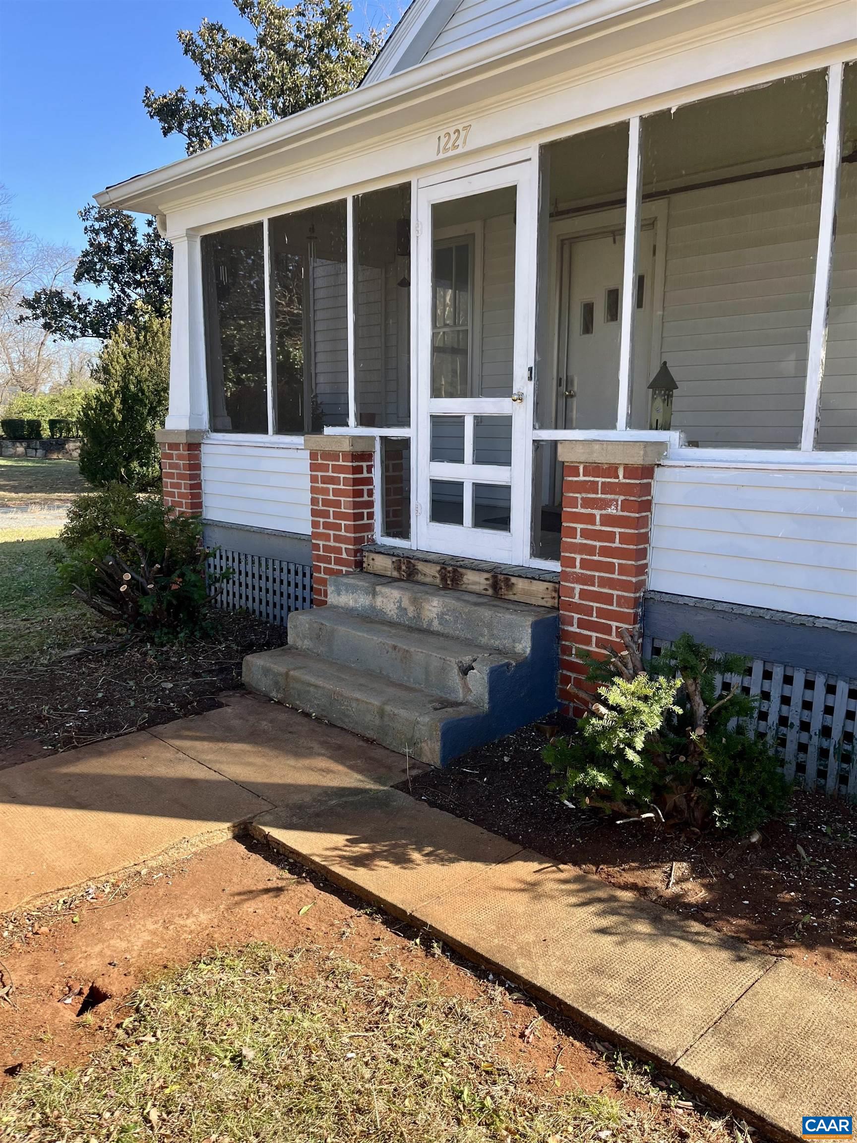 1227 Blue Ridge Avenue Crozet, VA 22932 - Photo 11 of 17 a view of a house with a yard