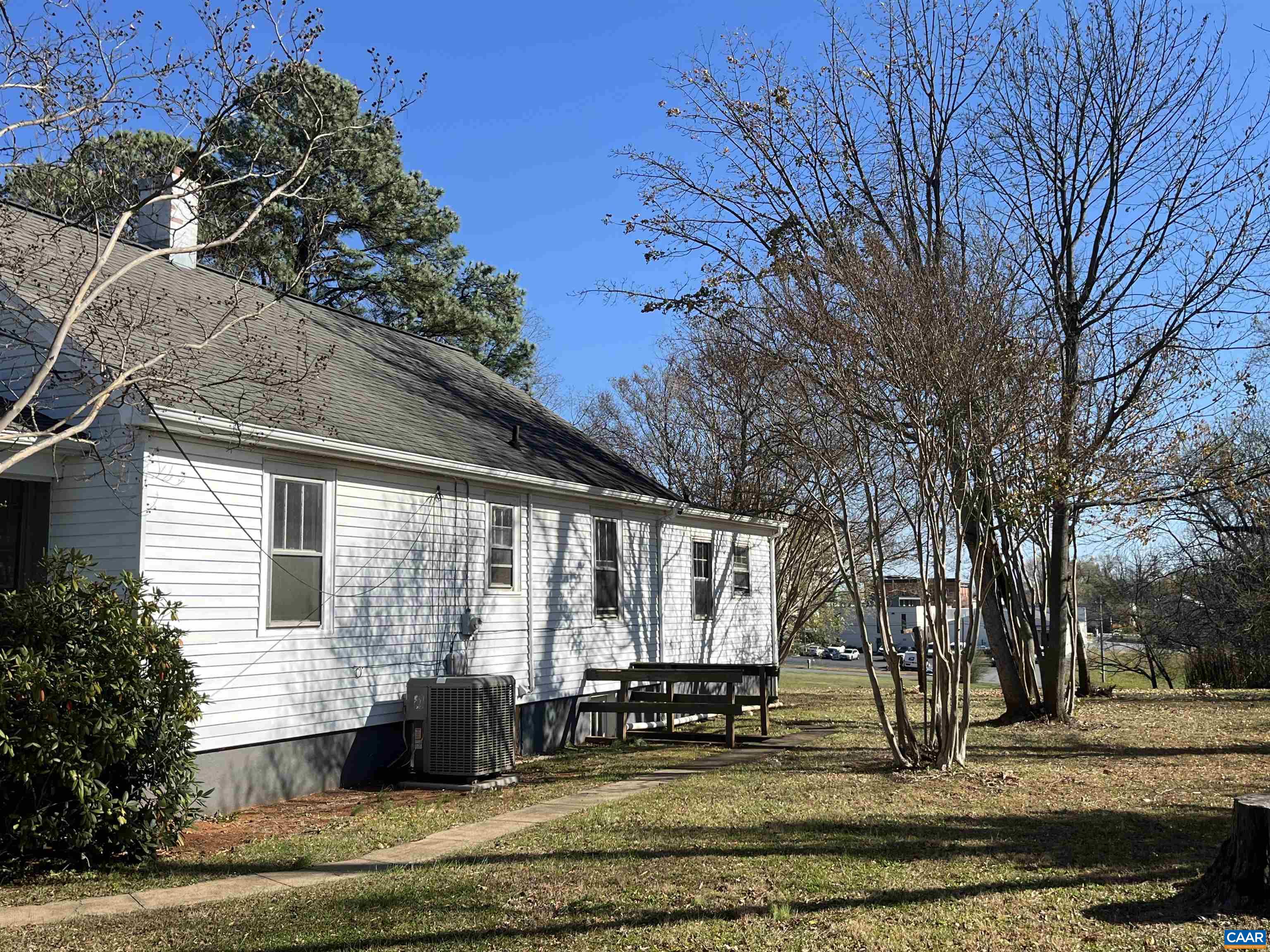 1227 Blue Ridge Avenue Crozet, VA 22932 - Photo 14 of 17 a front view of a house with a yard