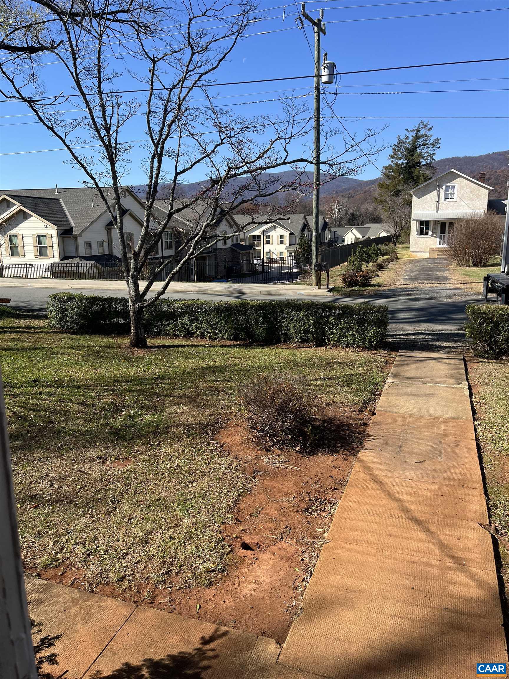 1227 Blue Ridge Avenue Crozet, VA 22932 - Photo 17 of 17 a view of a yard with cars