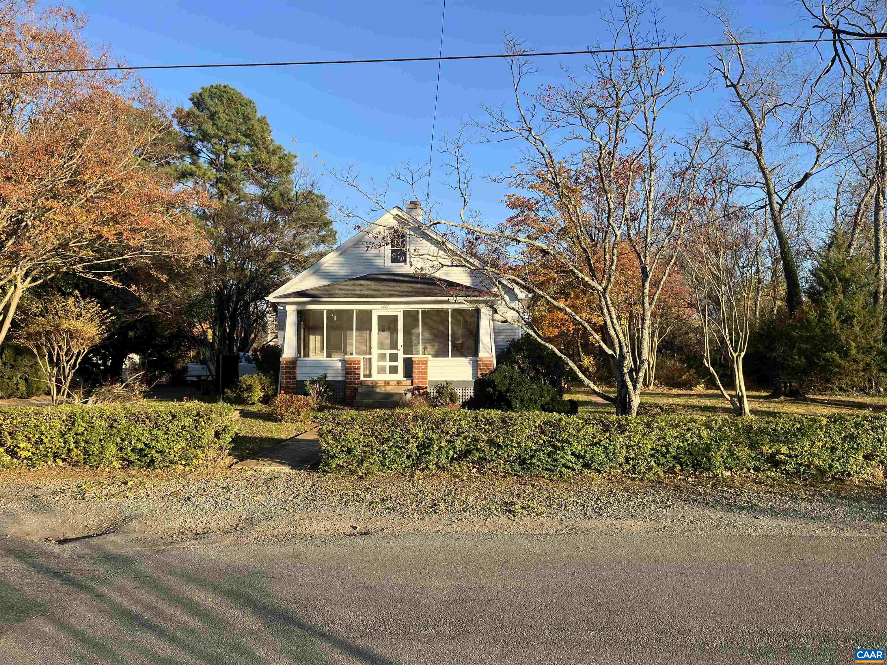 1227 Blue Ridge Avenue Crozet, VA 22932 - Photo 7 of 17 a front view of a house with a yard