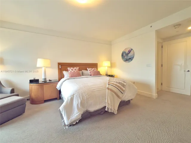 a bed room with a bed and a couch