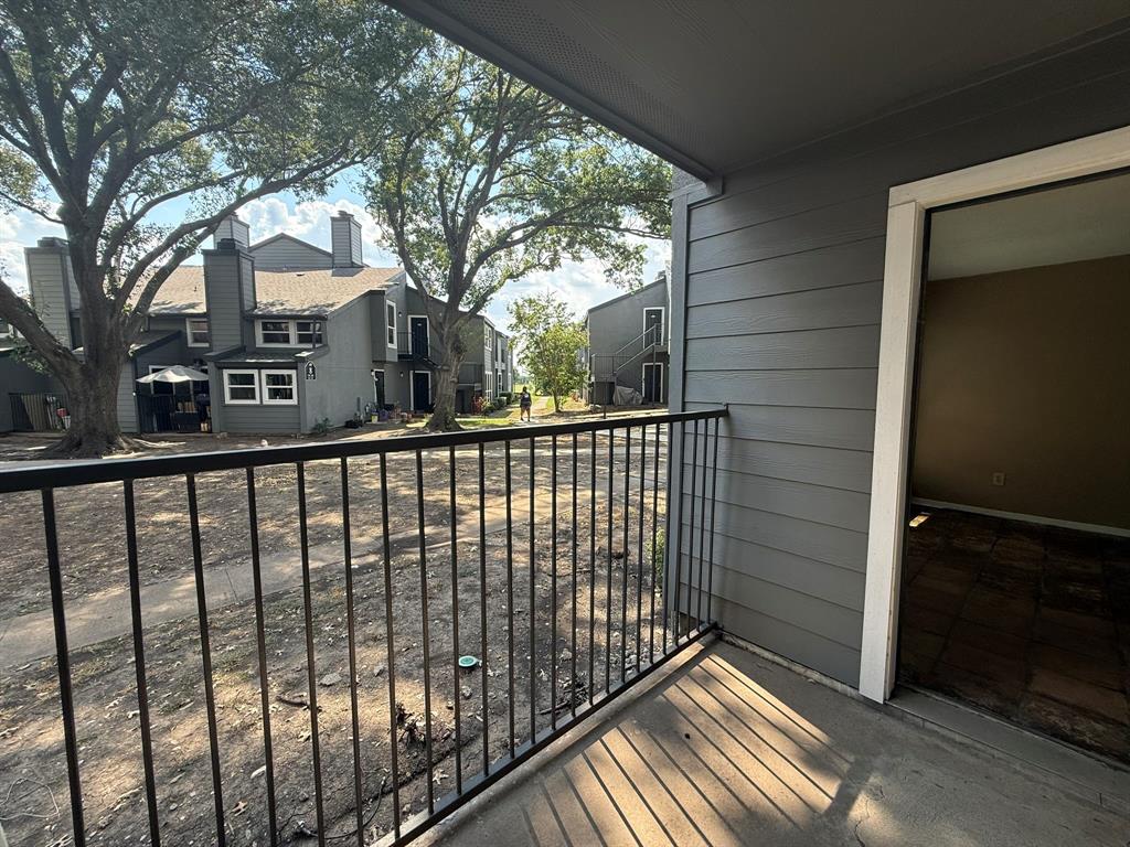 9696 Walnut Street, Unit 606 Dallas, TX 75243 - Photo 17 of 17 a view of a house with a iron gate
