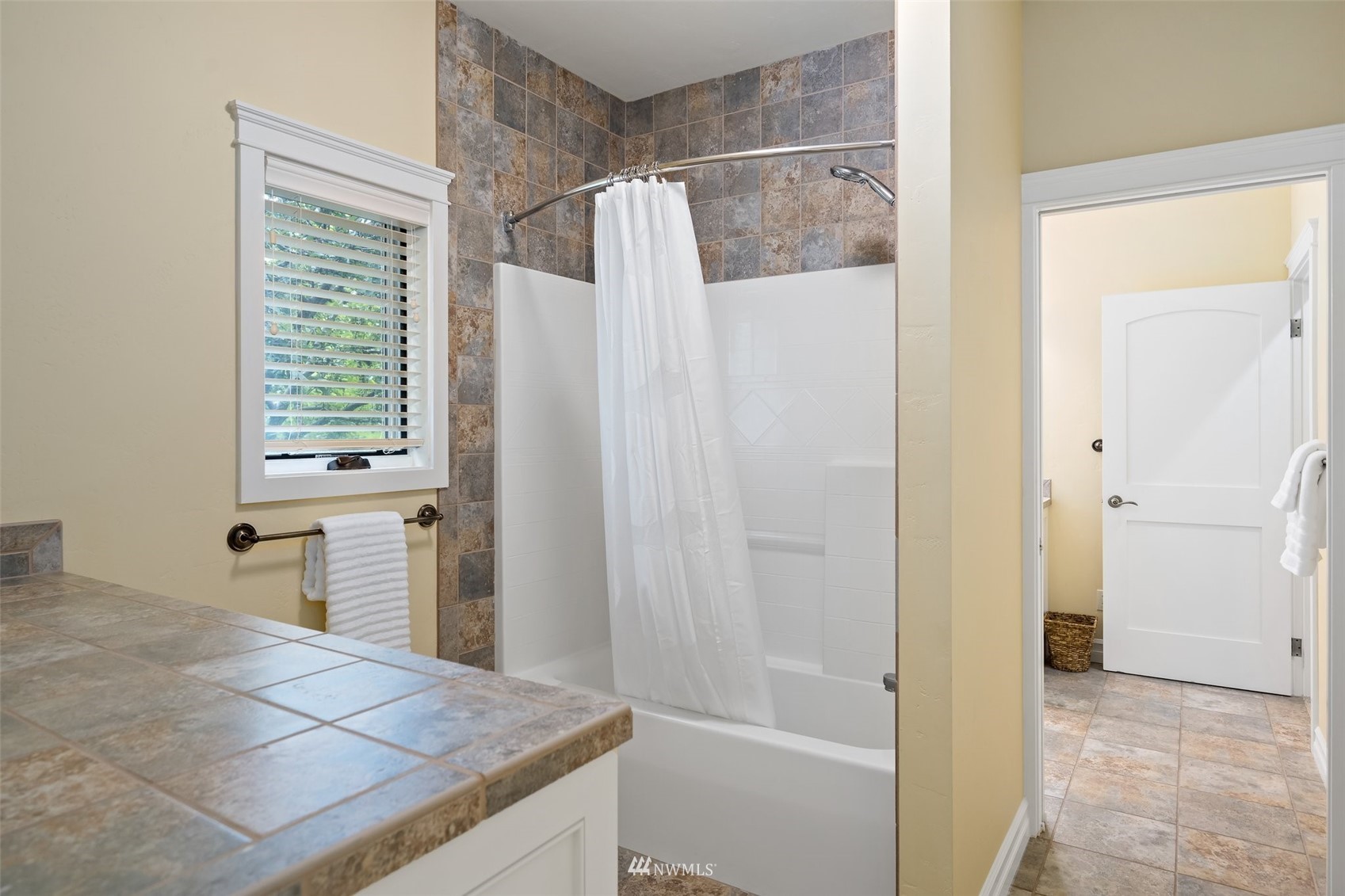 273 Galloway Road Touchet, WA 99360 - Photo 20 of 39 a bathroom with a granite countertop shower and a sink