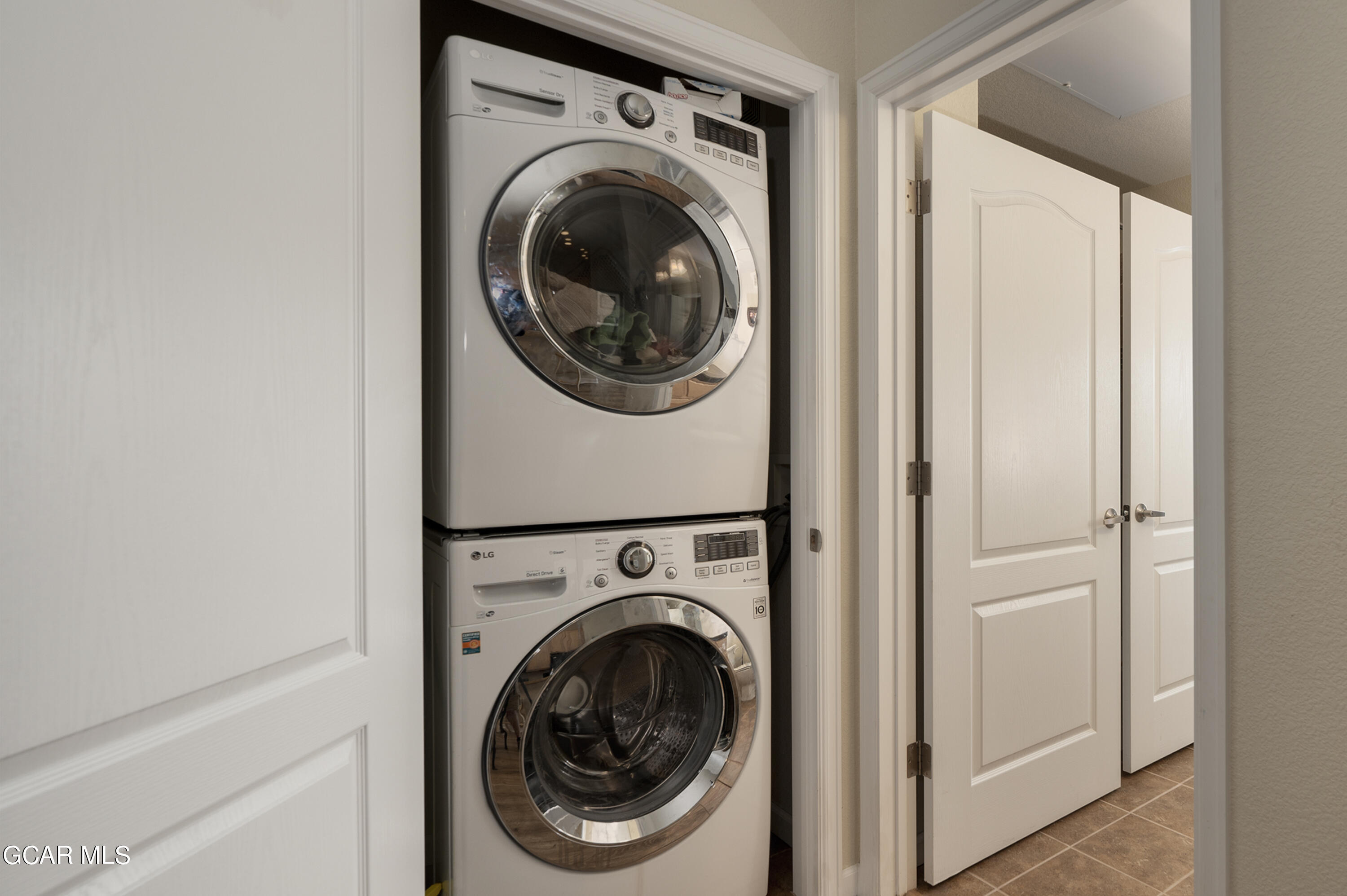 152 Village Road, Unit B306 Granby, CO 80446 - Photo 18 of 32 a utility room with dryer and washer
