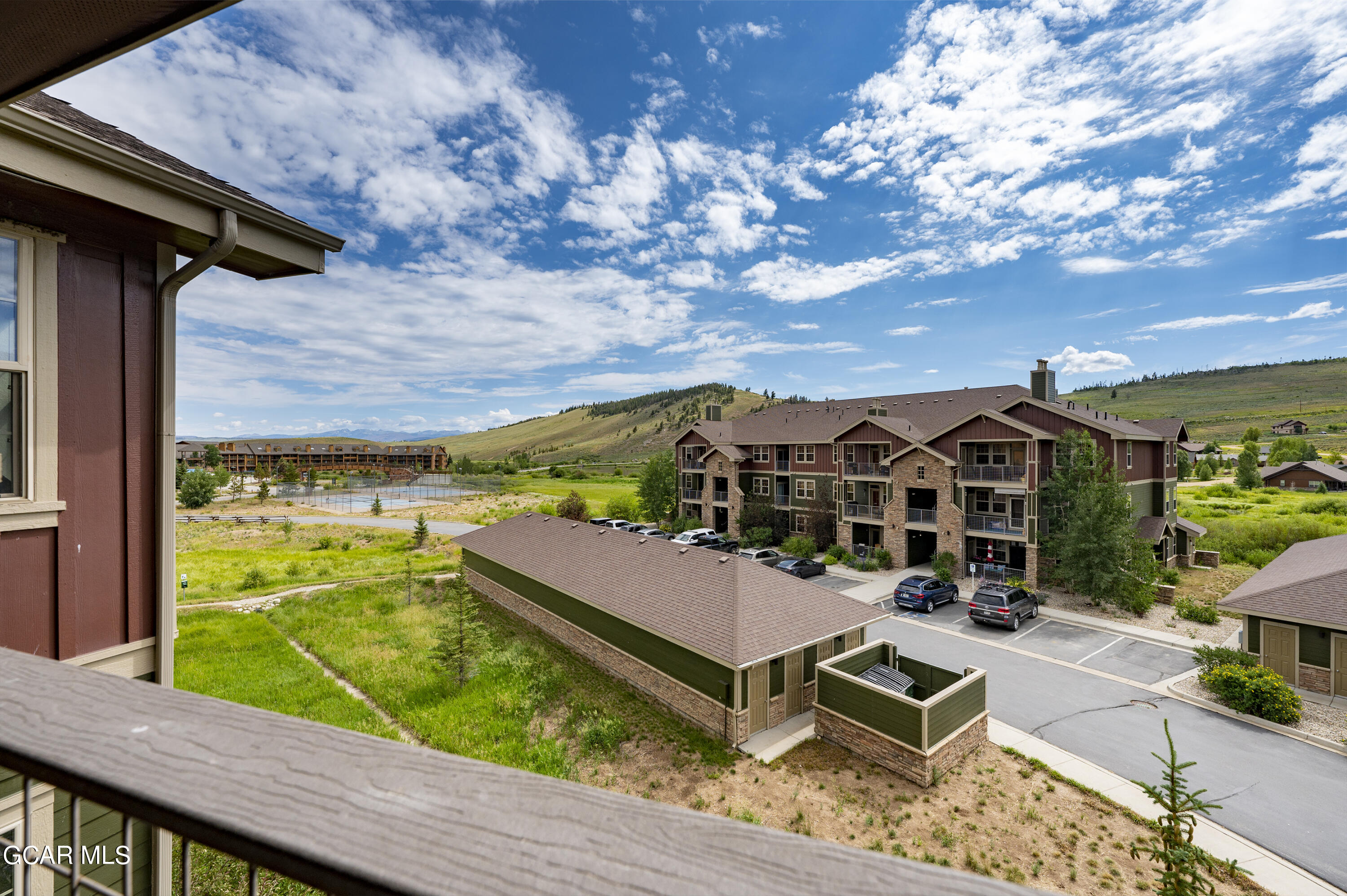 152 Village Road, Unit B306 Granby, CO 80446 - Photo 19 of 32 a view of houses with wooden floor and a table