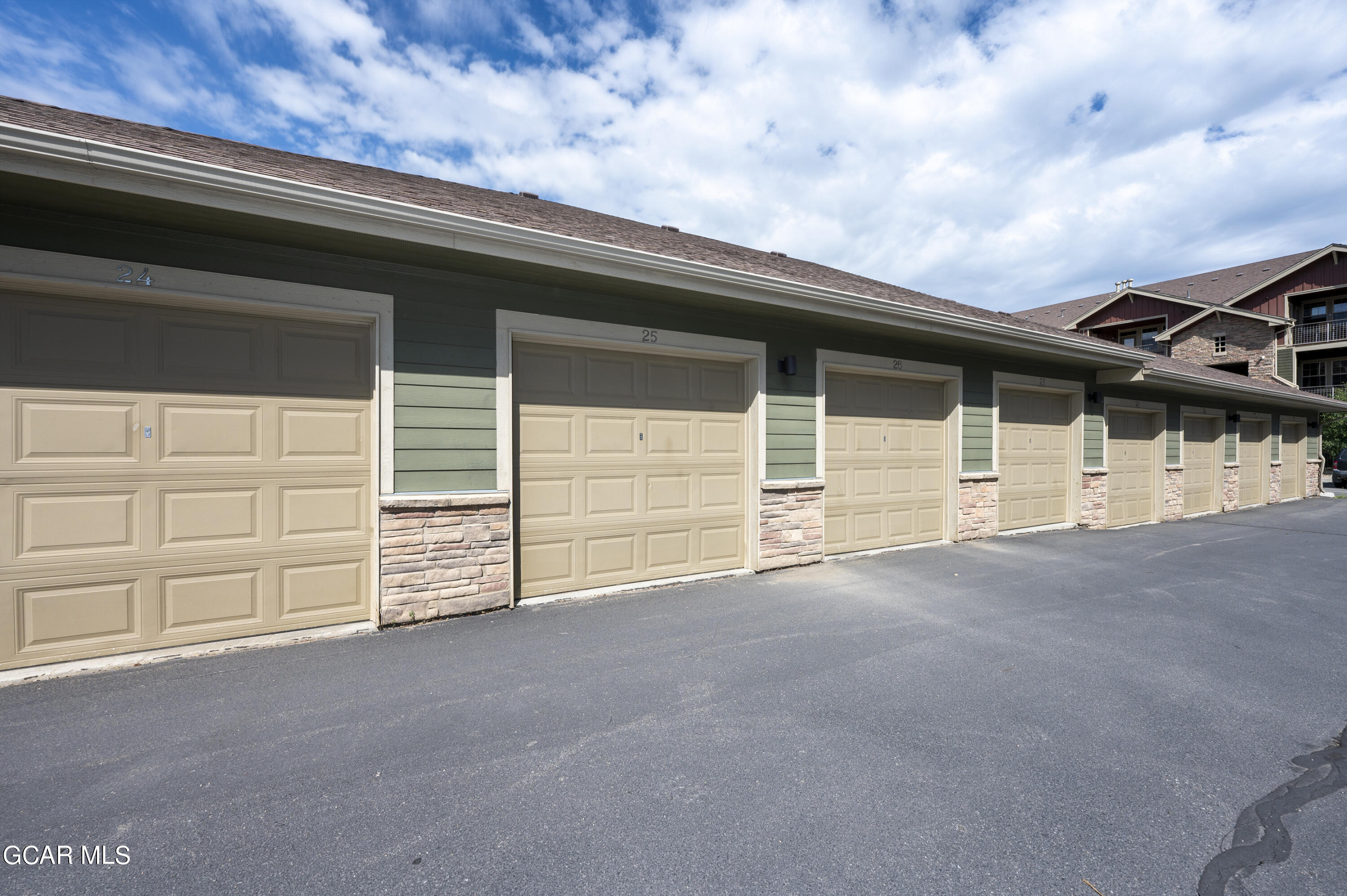 152 Village Road, Unit B306 Granby, CO 80446 - Photo 20 of 32 a view of a house with a garage