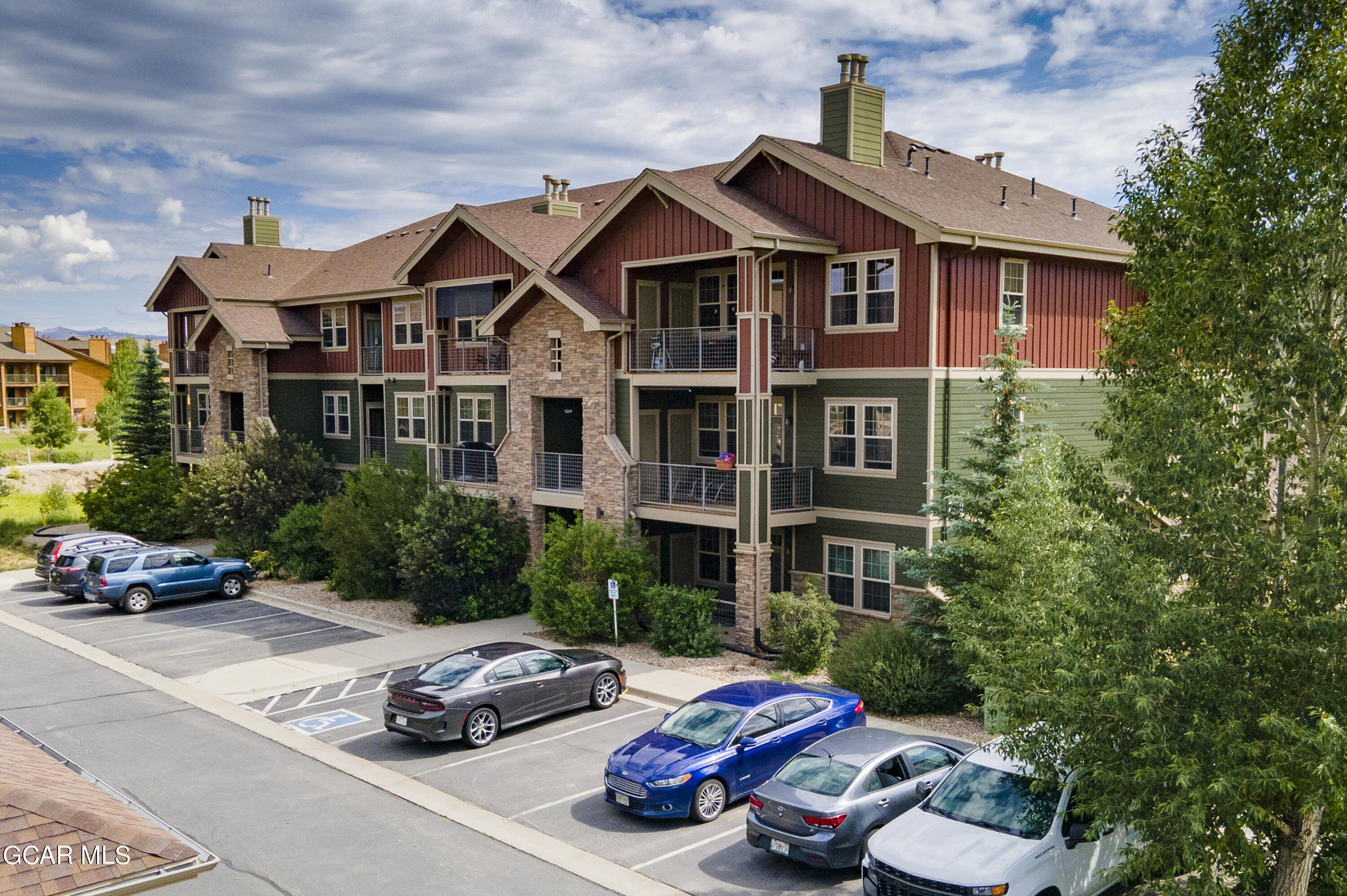 152 Village Road, Unit B306 Granby, CO 80446 - Photo 2 of 32 a car parked in front of a house