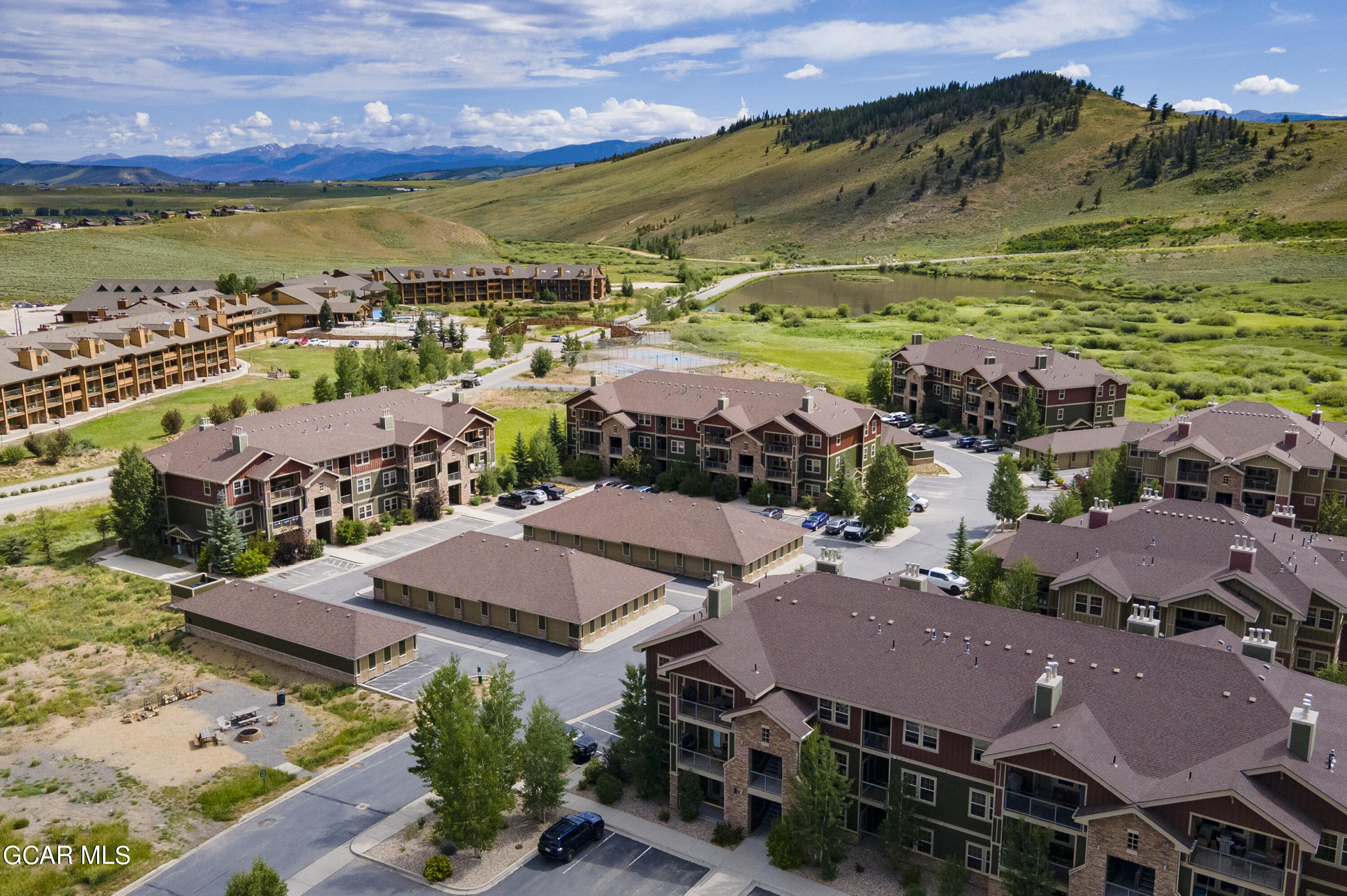 152 Village Road, Unit B306 Granby, CO 80446 - Photo 22 of 32 an aerial view of residential houses and outdoor space