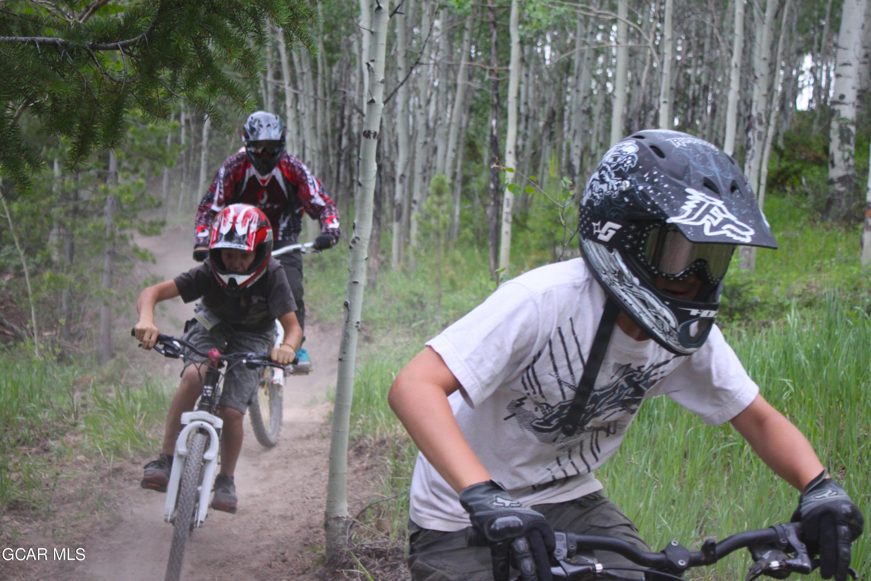 152 Village Road, Unit B306 Granby, CO 80446 - Photo 30 of 32 a view of a porch with furniture and a yard