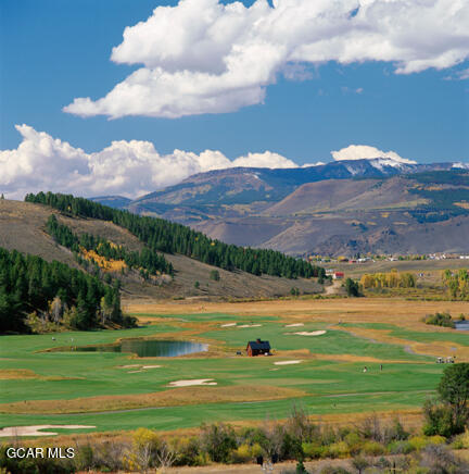 152 Village Road, Unit B306 Granby, CO 80446 - Photo 31 of 32 a view of a city with an ocean