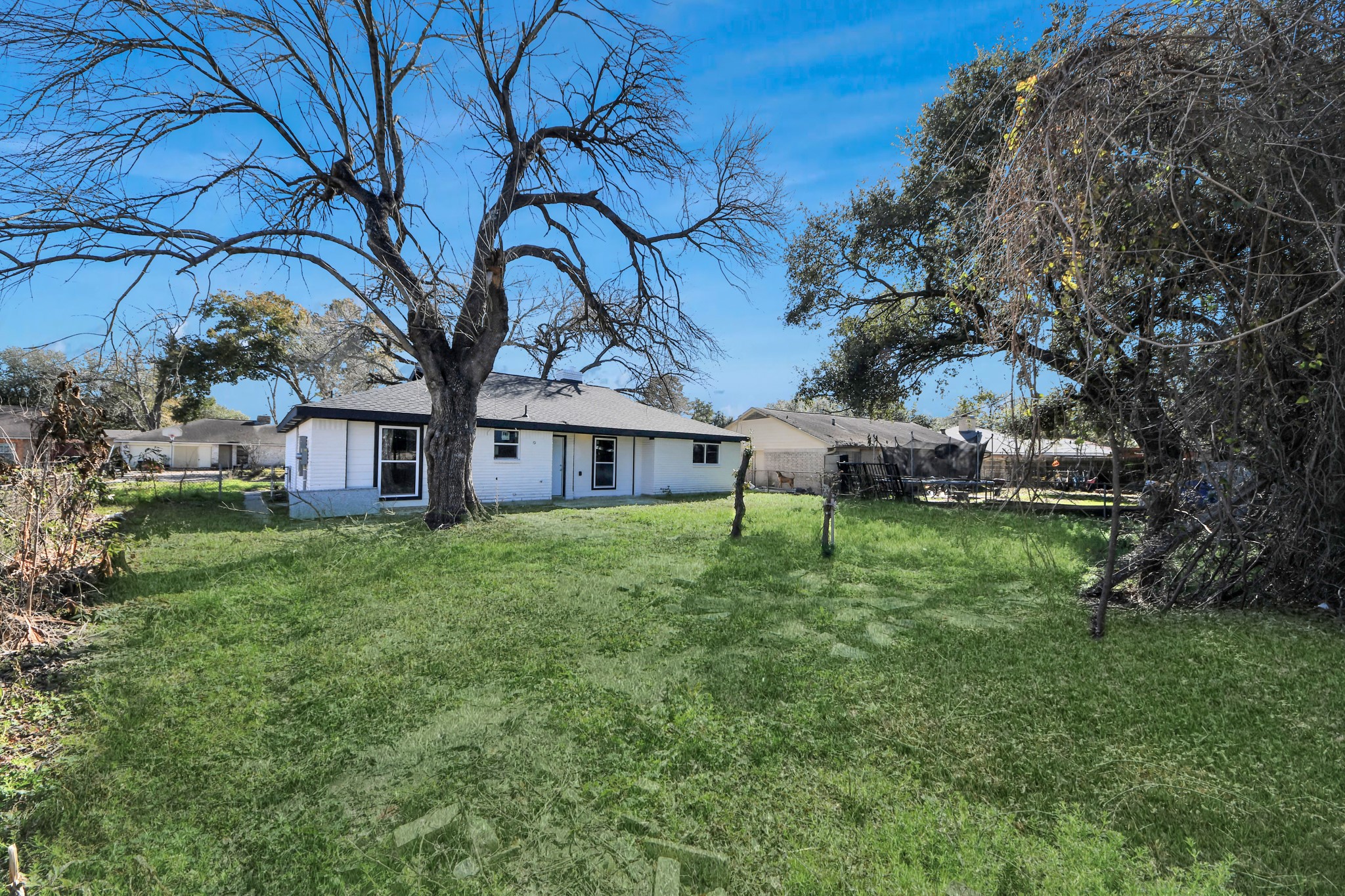 15123 Kaler Road Houston, TX 77060 - Photo 19 of 24 a view of a house with a yard