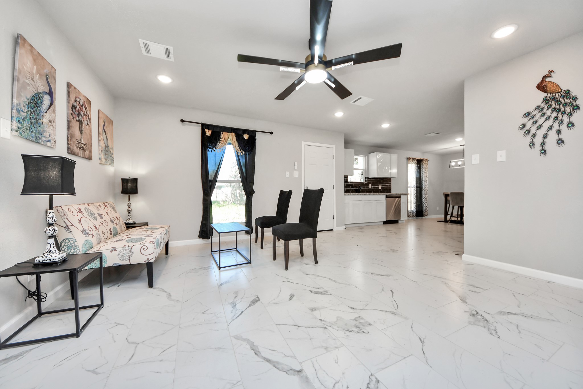 15123 Kaler Road Houston, TX 77060 - Photo 7 of 24 a view of kitchen with furniture and window