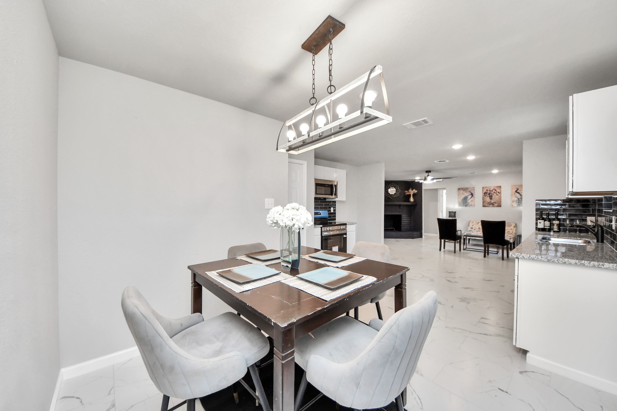 15123 Kaler Road Houston, TX 77060 - Photo 10 of 24 a view of a dining room with furniture