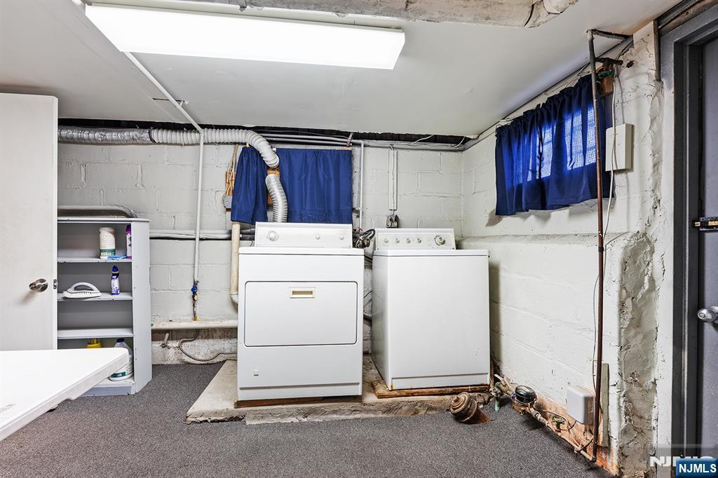 15 Victor Place Irvington, NJ 07111 - Photo 8 of 12 a utility room with dryer and washer
