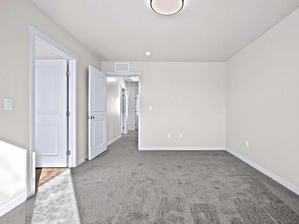 a bathroom with 2 sink and a mirror