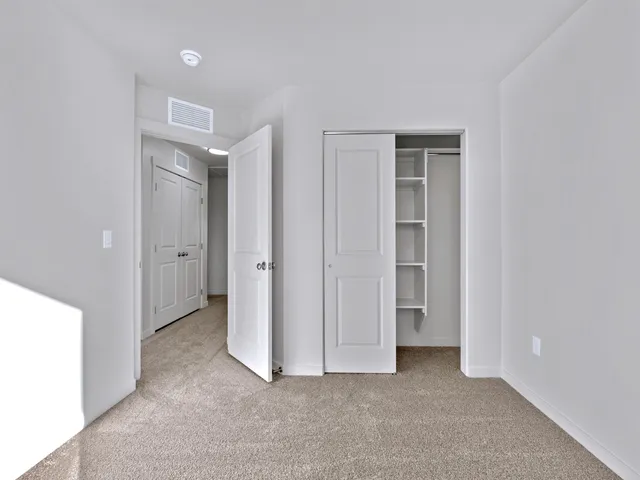 an empty room with windows