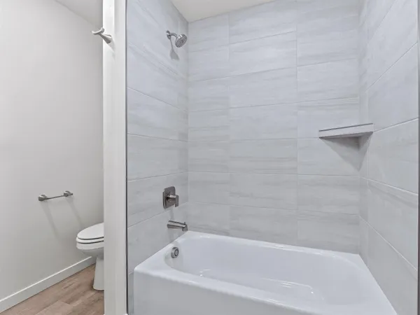 a view of a hallway with closet area