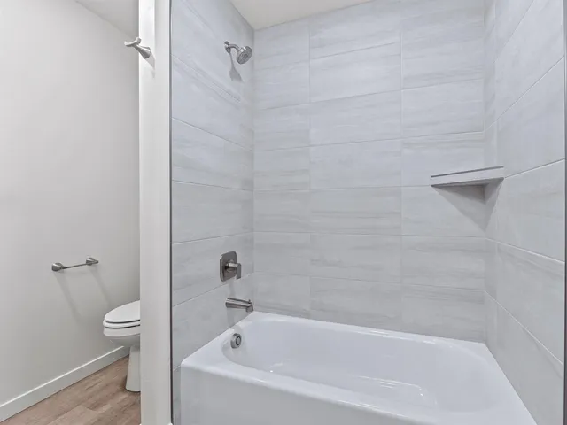 a view of a hallway with closet area