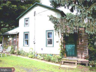 99 Gelsinger Road Sinking Spring, PA 19608 - Photo 1 of 6 a front view of a house with a yard