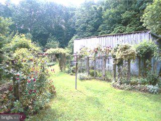 99 Gelsinger Road Sinking Spring, PA 19608 - Photo 3 of 6 a view of a yard with a tree
