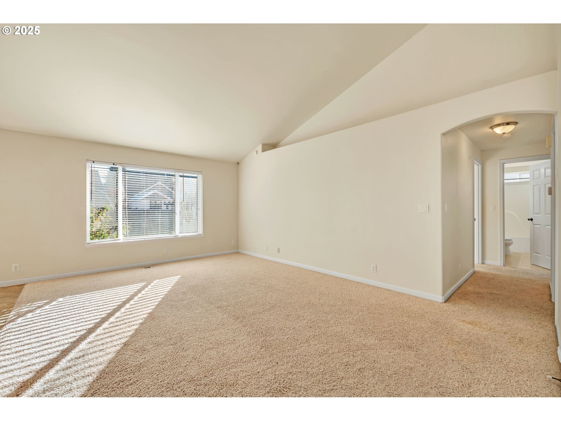 158 Mackin Avenue Eugene, OR 97404 - Photo 12 of 45 a view of an empty room with a window