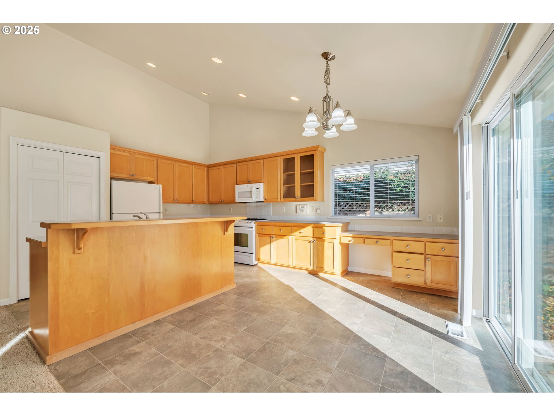 158 Mackin Avenue Eugene, OR 97404 - Photo 15 of 45 a view of a kitchen with large windows