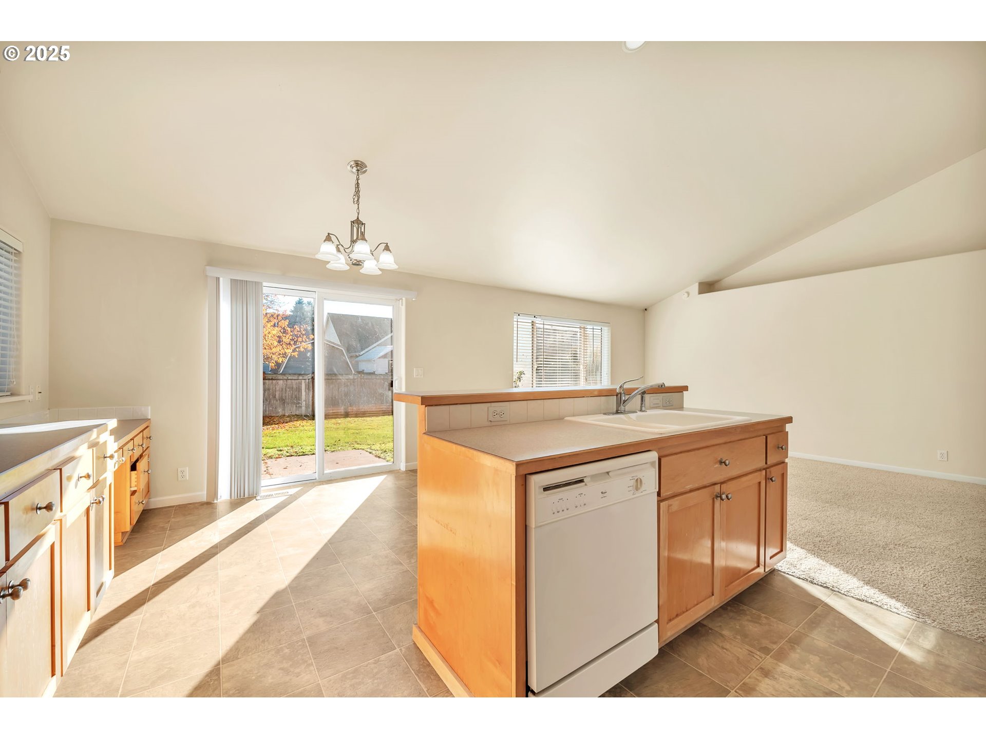 158 Mackin Avenue Eugene, OR 97404 - Photo 22 of 45 a kitchen with a sink and a stove top oven