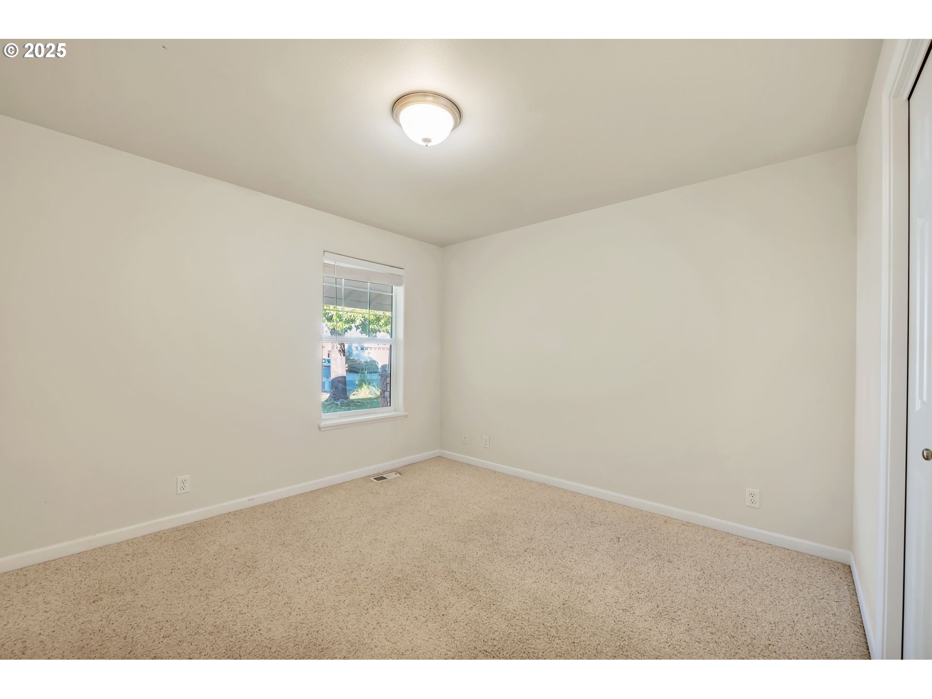 158 Mackin Avenue Eugene, OR 97404 - Photo 24 of 45 a view of an empty room and window