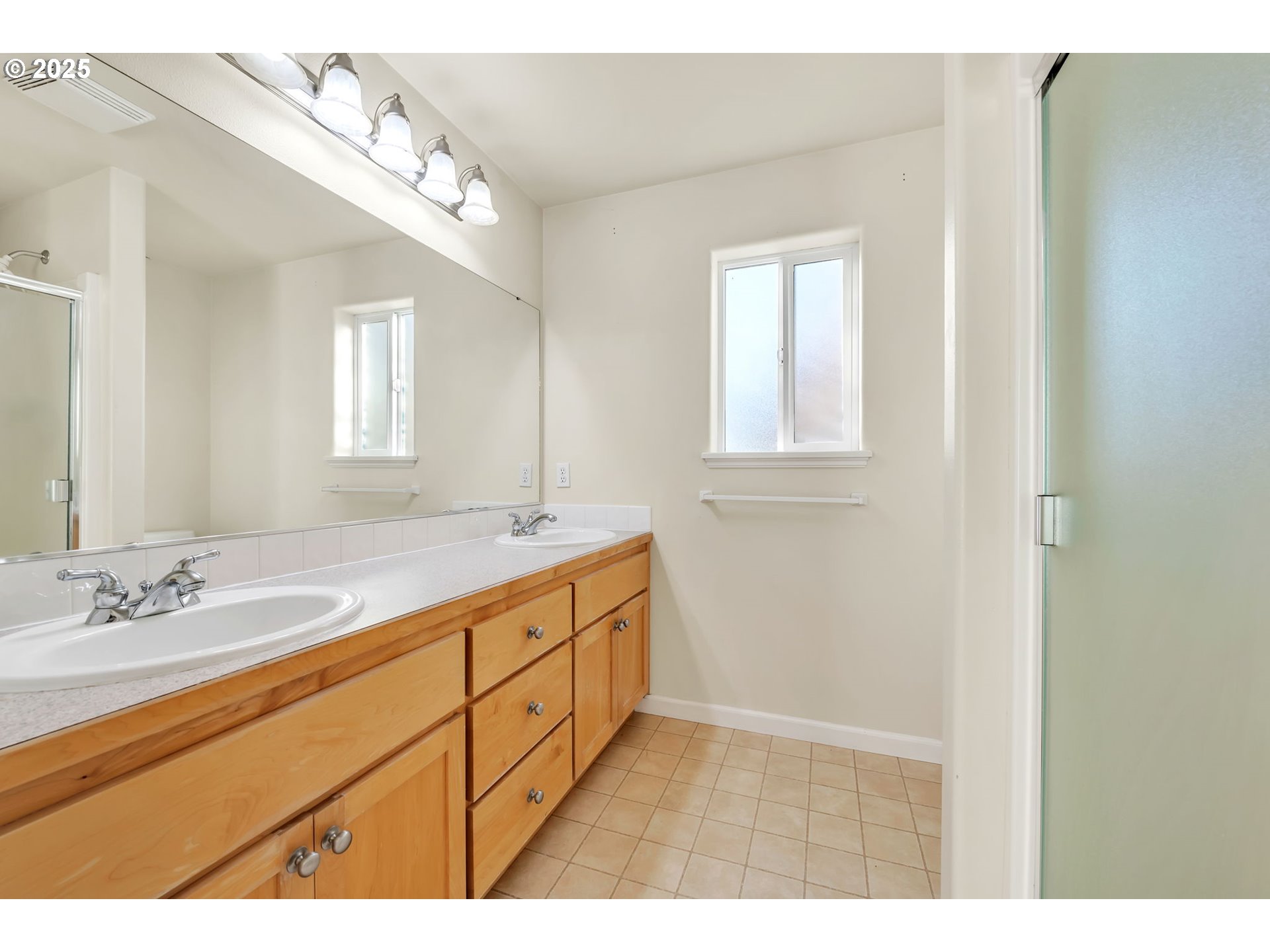 158 Mackin Avenue Eugene, OR 97404 - Photo 38 of 45 a bathroom with a sink a vanity and a mirror