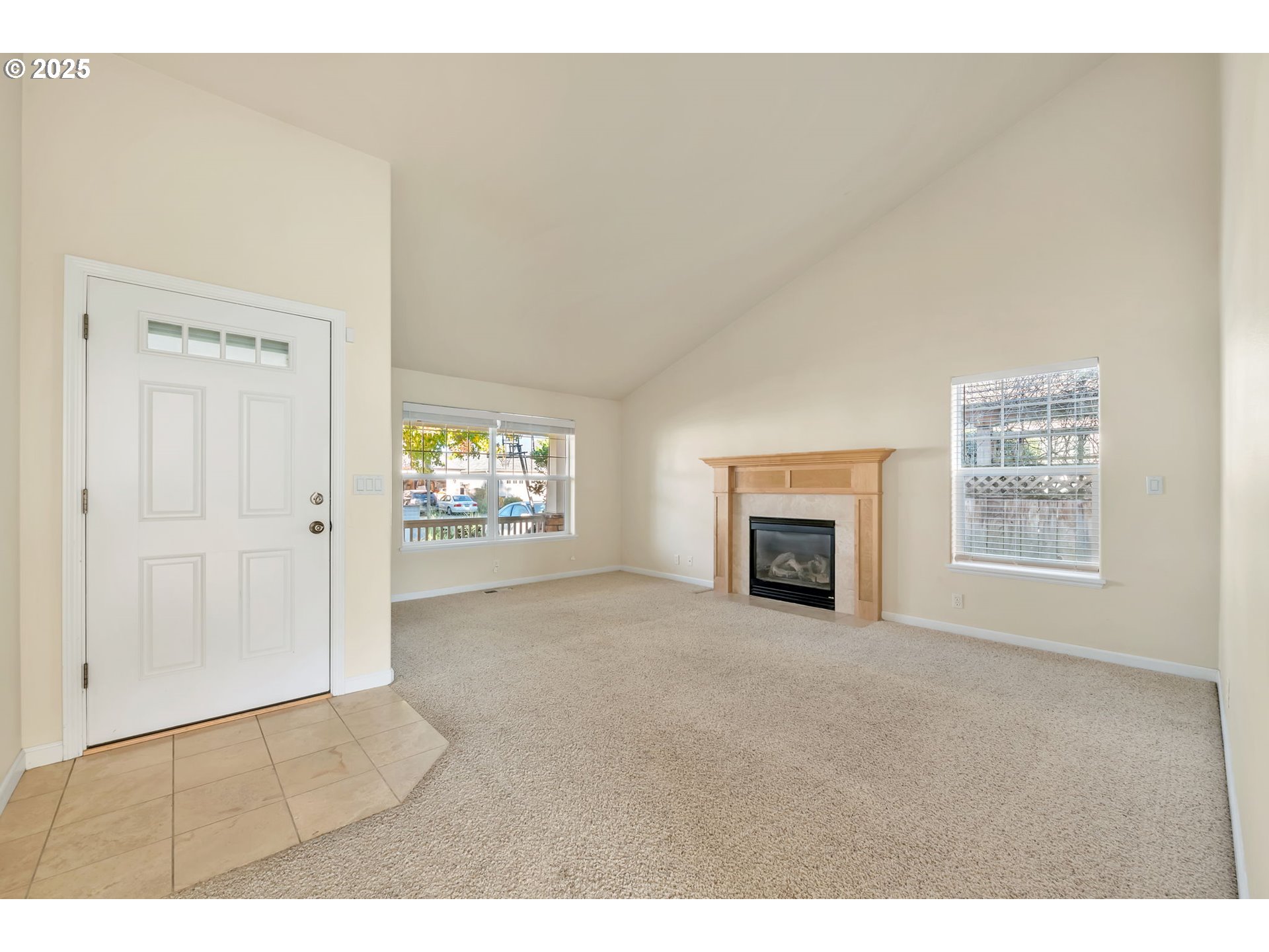 158 Mackin Avenue Eugene, OR 97404 - Photo 6 of 45 a view of a livingroom with an empty space and a fireplace