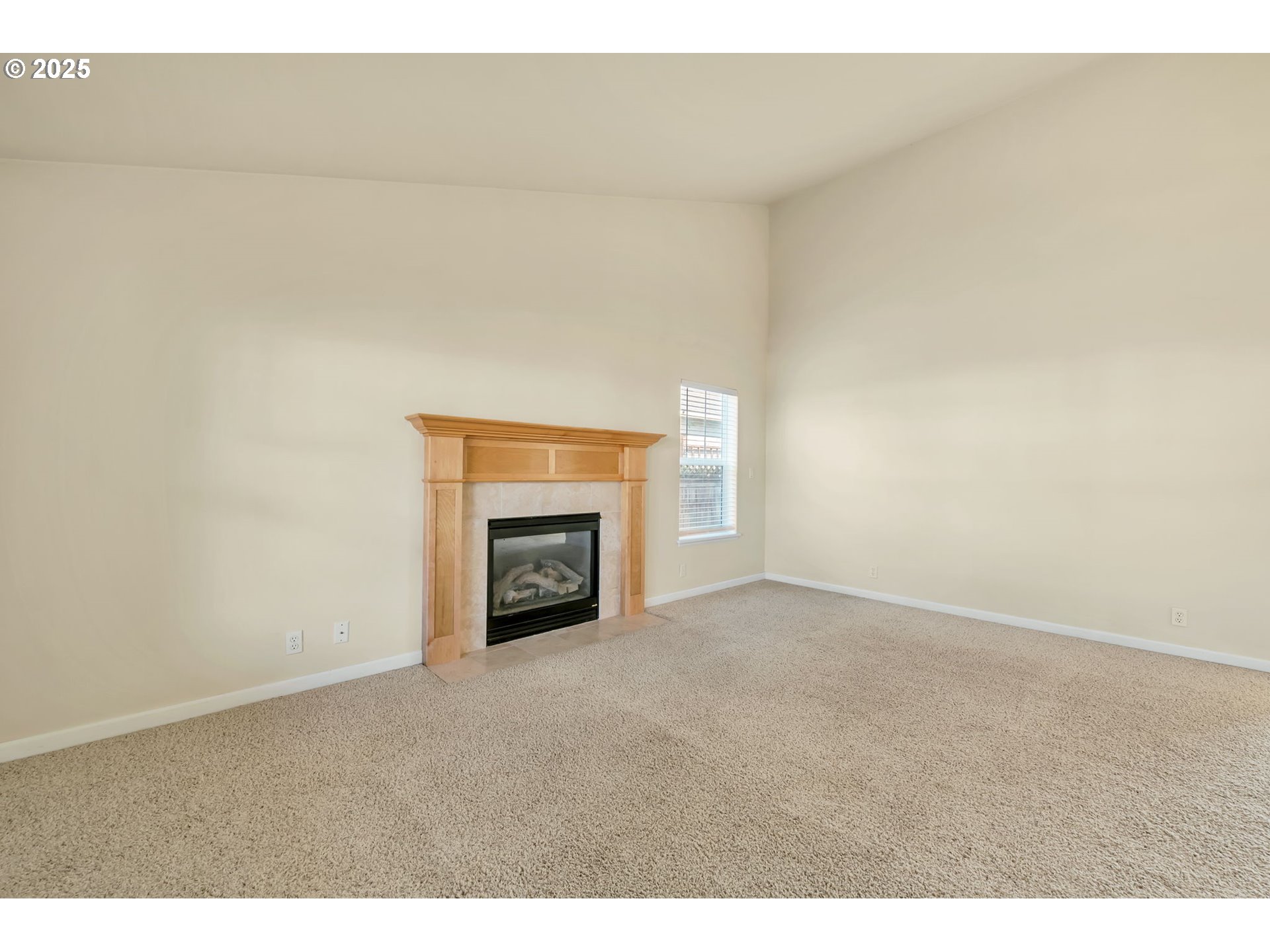 158 Mackin Avenue Eugene, OR 97404 - Photo 10 of 45 a view of an empty room with a fireplace