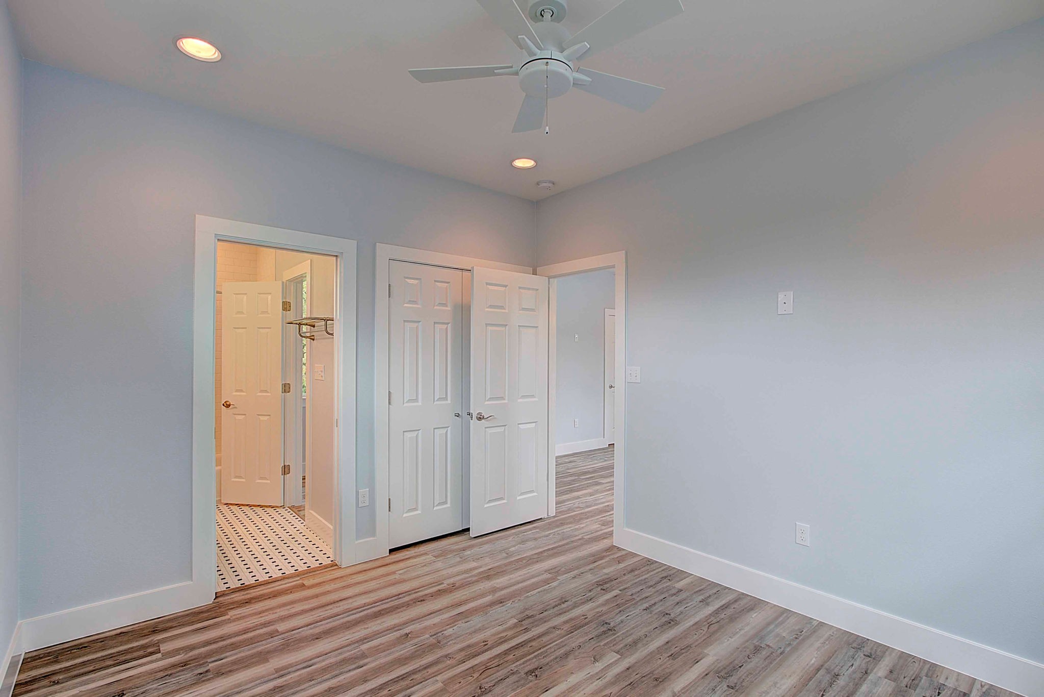 806 West Live Oak Street, Unit 2 Austin, TX 78704 - Photo 12 of 16 a view of an empty room and wooden floor