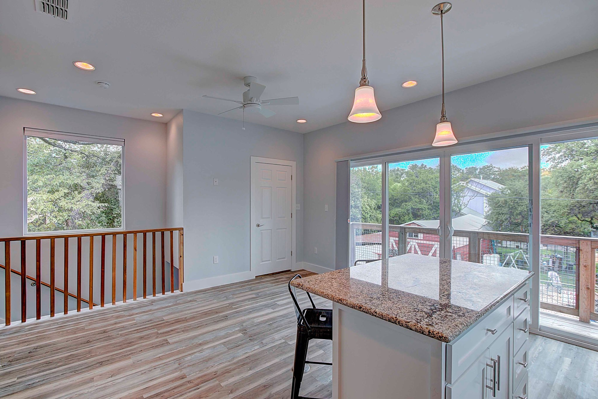806 West Live Oak Street, Unit 2 Austin, TX 78704 - Photo 7 of 16 a kitchen with a table chairs and wooden floor