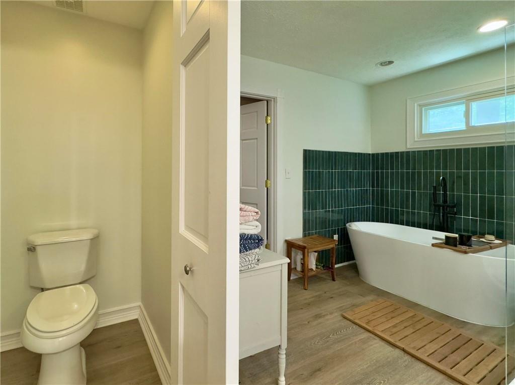 90 Howard Road Senoia, GA 30276 - Photo 31 of 73 a bathroom with a sink toilet and shower