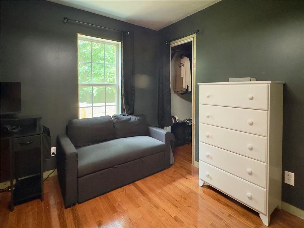 90 Howard Road Senoia, GA 30276 - Photo 39 of 73 a living room with furniture and a closet