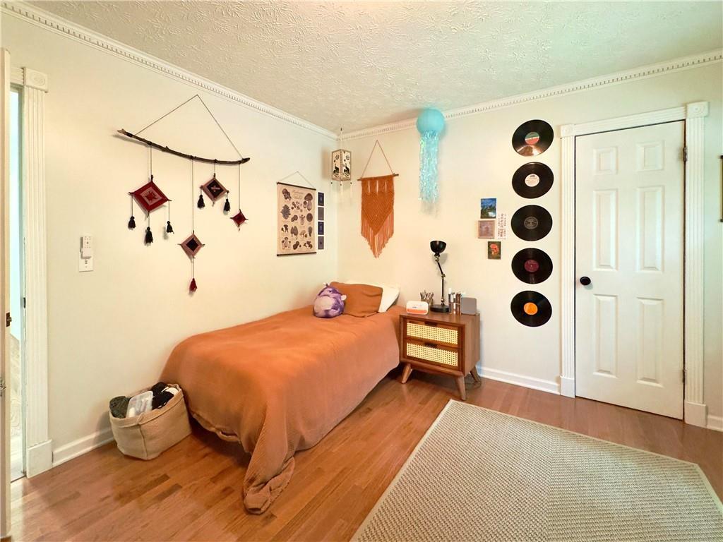 90 Howard Road Senoia, GA 30276 - Photo 43 of 73 a bedroom with a bed and a window