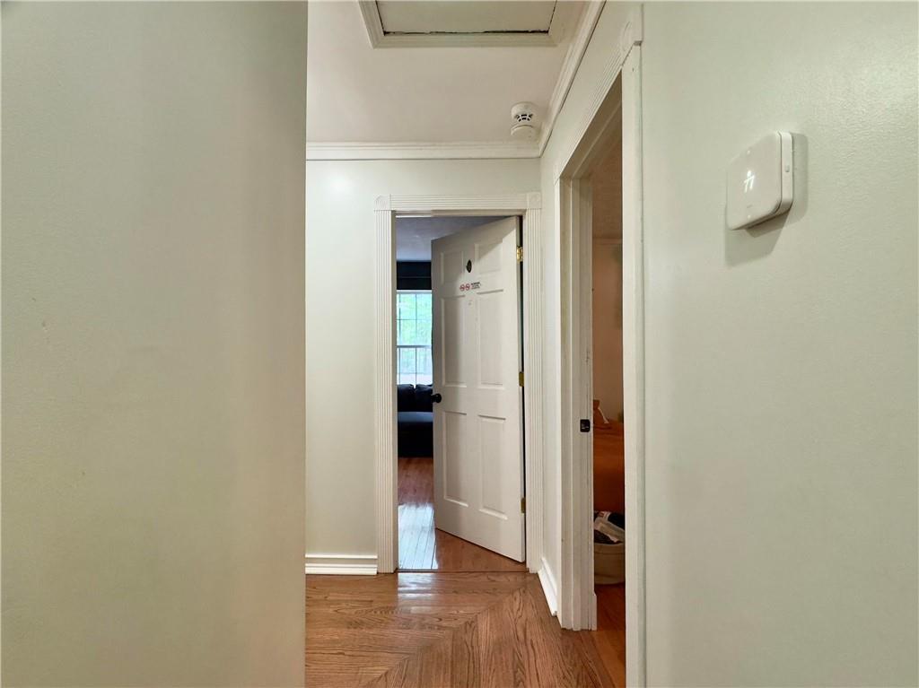 90 Howard Road Senoia, GA 30276 - Photo 45 of 73 a view of a hallway with wooden floor
