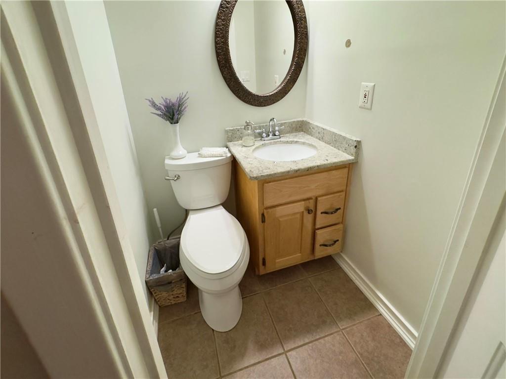 90 Howard Road Senoia, GA 30276 - Photo 48 of 73 a bathroom with a sink and a mirror